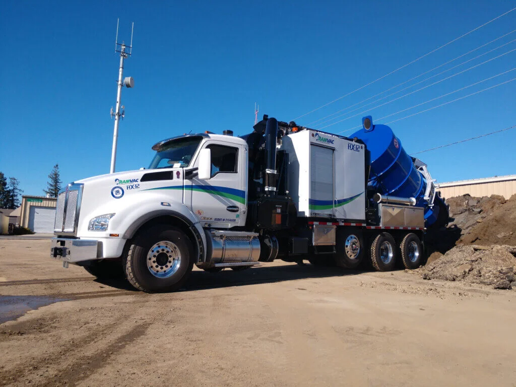 Refuse truck front loader